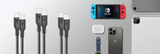 A set of black USB-C to USB-C cables shown alongside compatible electronics, including a Nintendo Switch, a smartphone, a smartwatch, and a power bank, arranged on a light gray background.